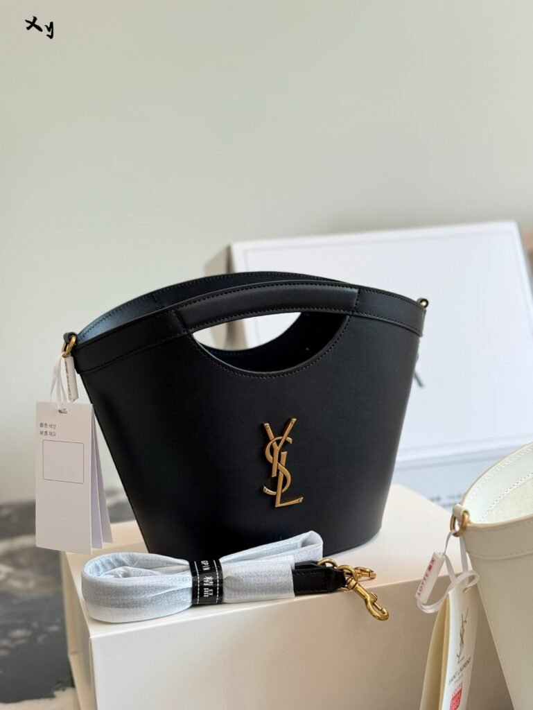 Saint Laurent Tote Fan-Shaped Basket Bag. Features a fan-shaped exterior with openwork details.