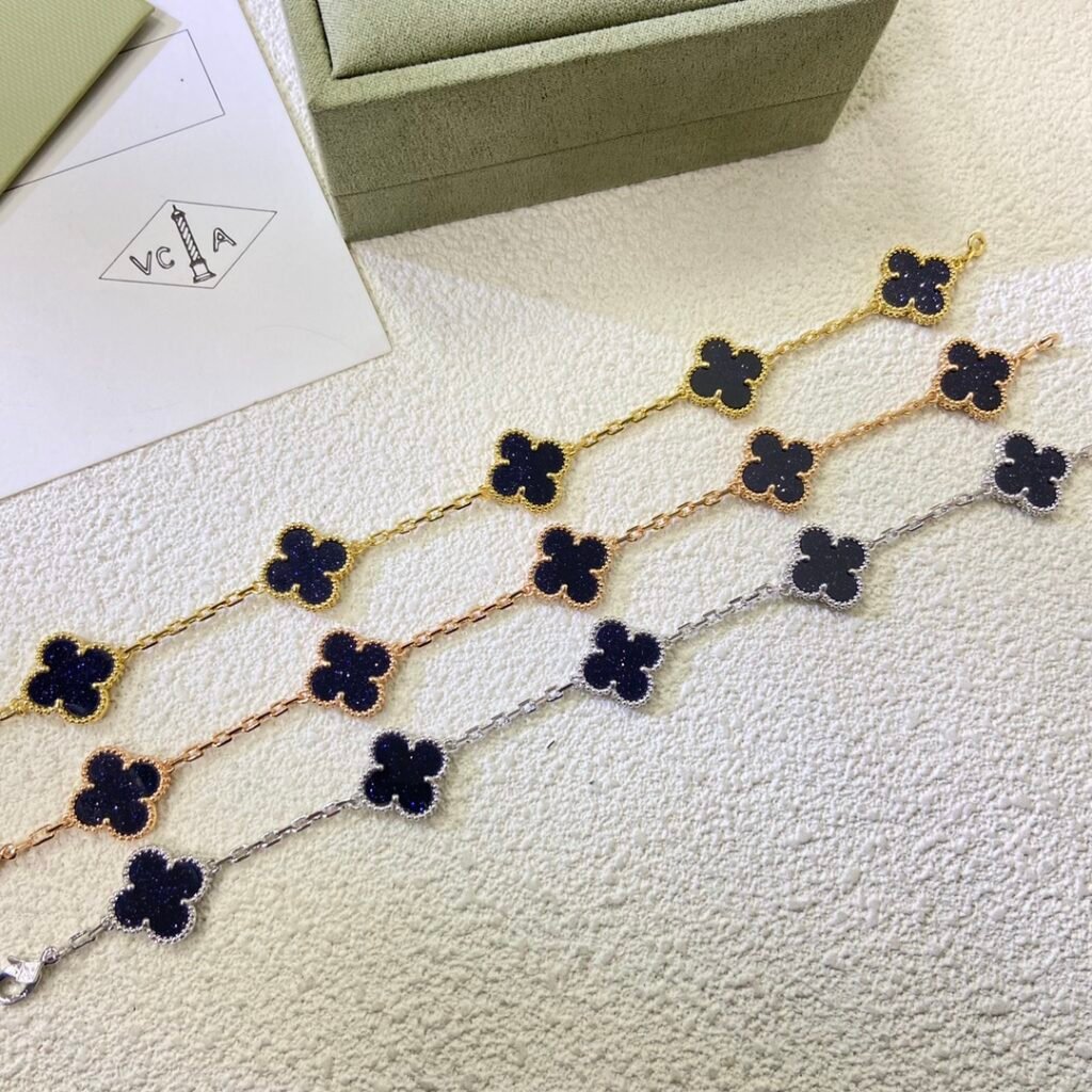 Van Cleef & Arpels Bracelet, Fantasy Gold and Gemstone Five-Flower Bracelet